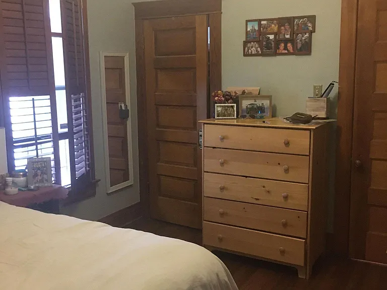 Upstairs bedroom #2 or office also has an overhead fan and plantation shutters.