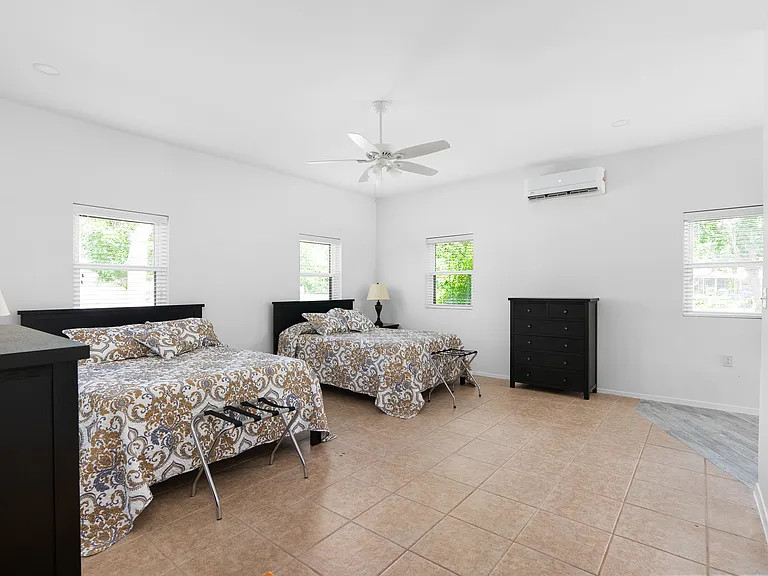 Bonus room includes 2 queen sides beds and chest of drawers