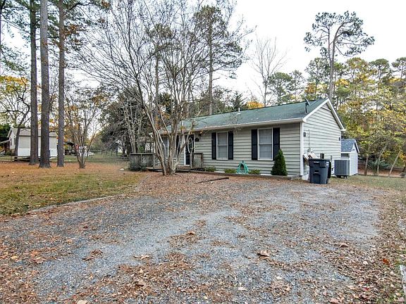 Side view with driveway.