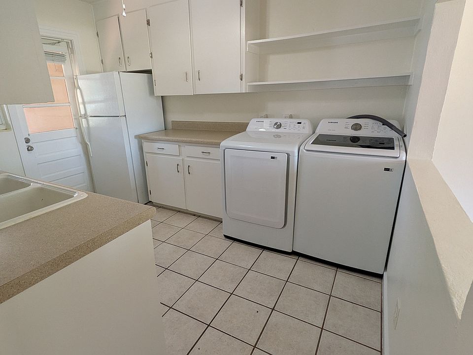 This is a view of the kitchen as you enter the room.