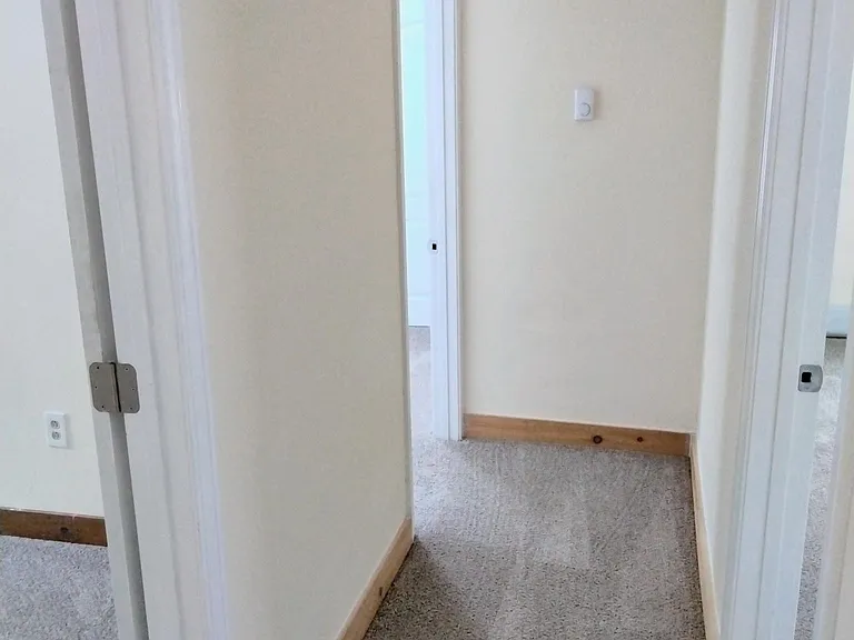 Hallway connecting bedrooms