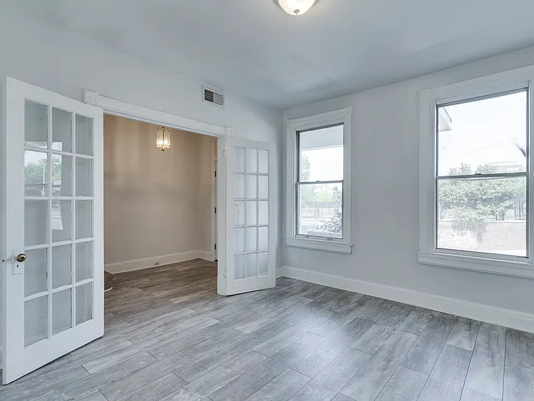 The first-floor windows have been replaced with brand-new, energy-efficient windows.