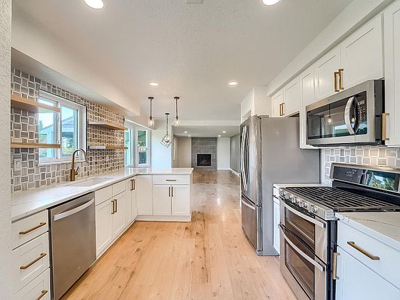 2nd image of 9923 E Exposition Ave