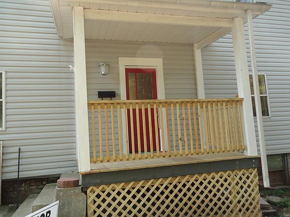 Covered front entrance with small porch