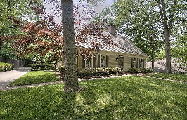 Charming Salt Box style set among beautiful trees