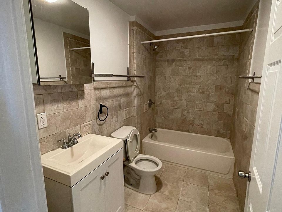 24 Lenox Ave, East Orange, NJ - Apt. 2 -- Bathroom with new, expensive mirrored medicine cabinet and vanity
