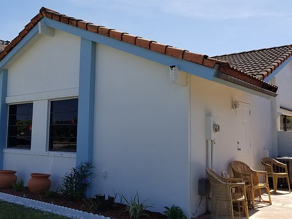 Side entrance front of house