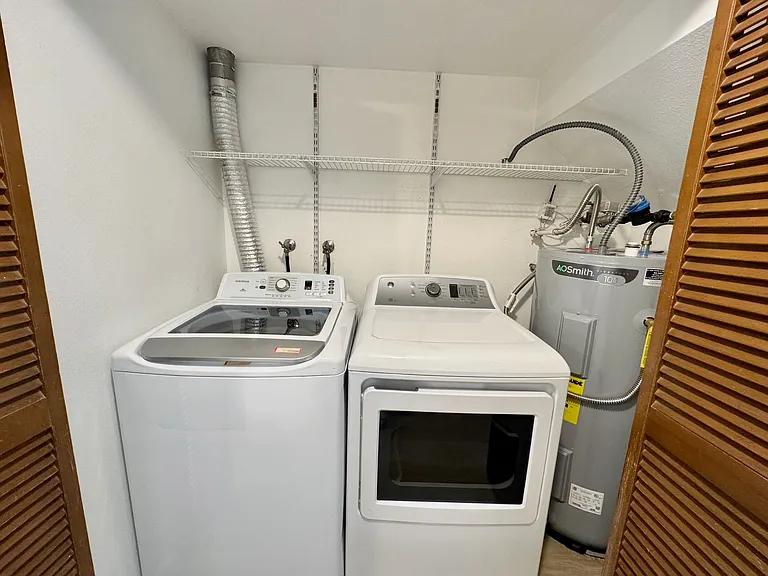 Full-size washer and dryer in unit on main level. Water is separately submetered.