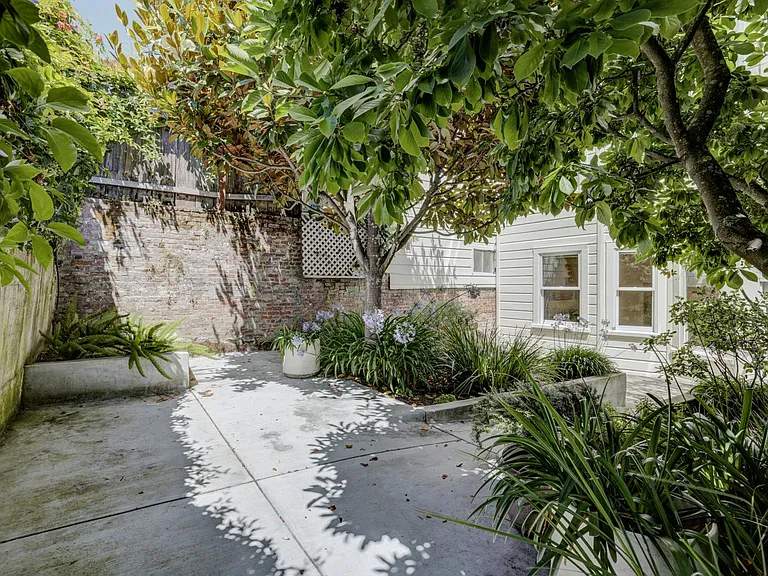 Gorgeous Private Backyard: Garden, Deck and Concrete Patio Space for outdoor furniture/dining