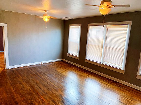 Large Living room with site lines into dinning room and kitchen. 16 X 16.