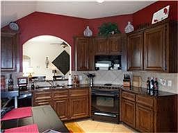This Gorgeous Kitchen has Job Built Cabinets, Granite Counter Tops and Tile Flooring