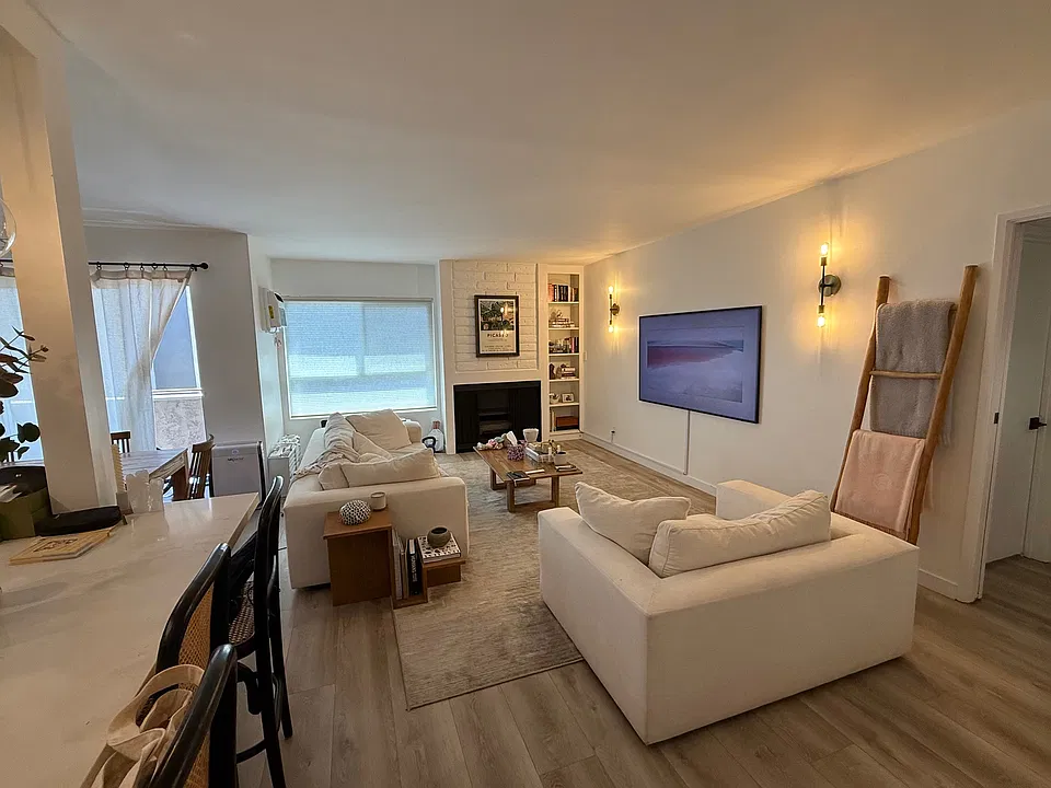 living room with island bar from kitchen