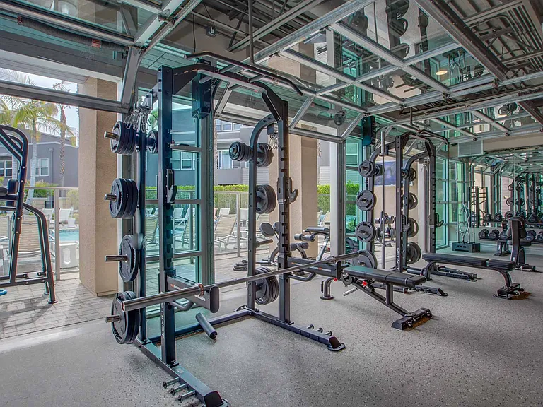 Work out indoors with resistance and cardio machines or lift weights in the outdoor workout space