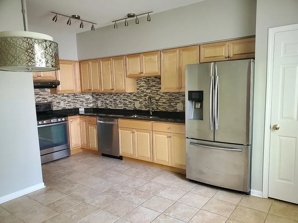 Kitchen with all SS appliances and granite countertop....