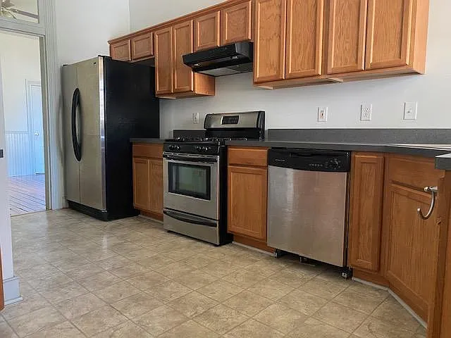 Kitchen (window and door to deck and backyard behind camera)