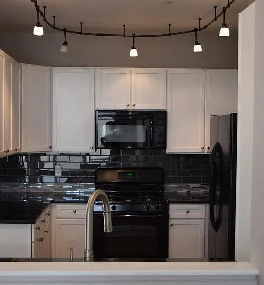 Updated tile in black and white kitchen