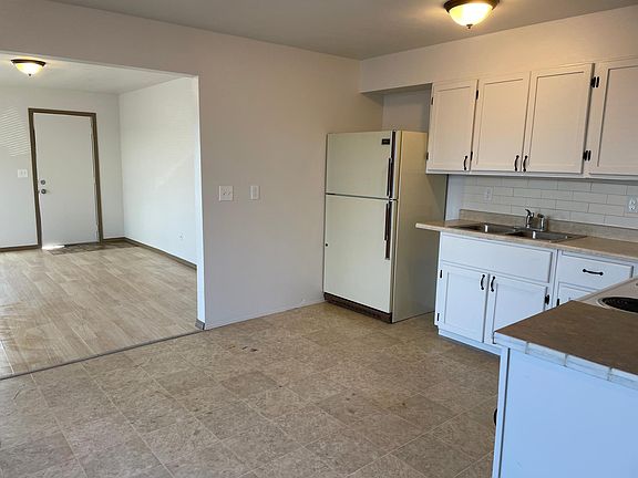 Kitchen looking into living room