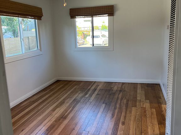Matching ceiling fans in the living room and bedrooms.