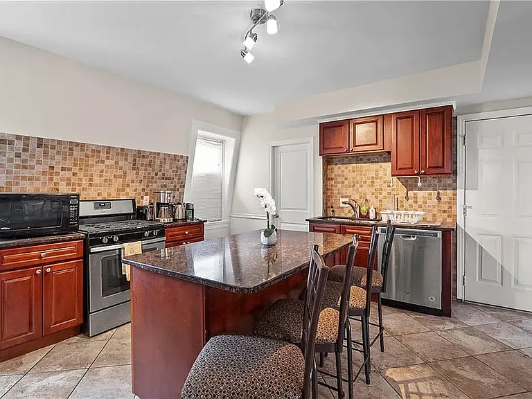 Kitchen looking at back entrance