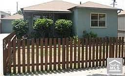 Front of house with fence
