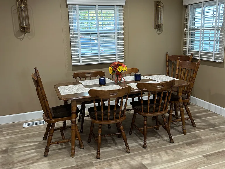 Dining area connected to kitchen and living room