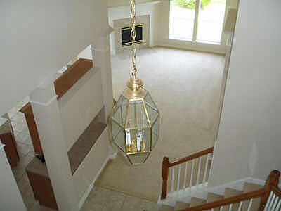  THE DEN IS OPEN TO THE KITCHEN/BREAKFAST ROOM. THIS ROOM HAS HIGH CEILINGS AND A COZY GASLOG FIREPLACE. 