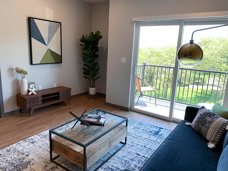 Our living rooms combine cozy spaces and natural light, with easy access to your balcony for a seamless indoor-outdoor experience.