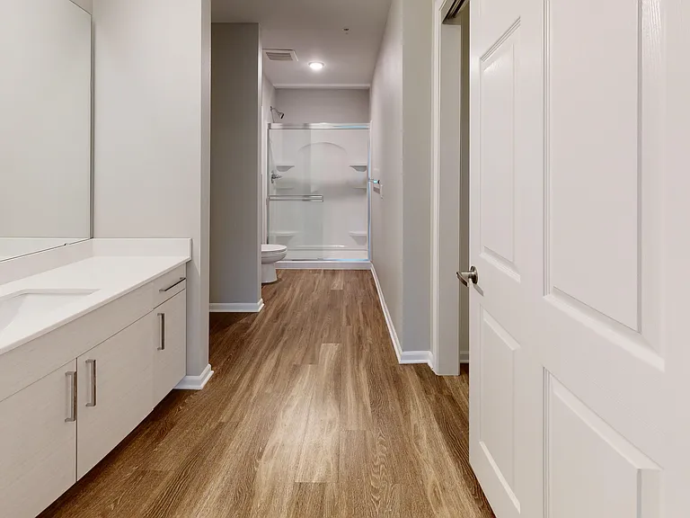 The primary en suite features a large vanity and walk-in shower. The primary en suite features a large vanity and walk-in shower.