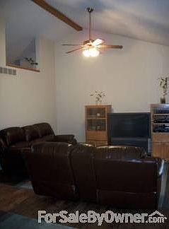 Upstairs living room : Cathedral ceilings, ceiling fan, new flooring