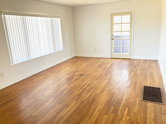 Living room, facing the north side door.