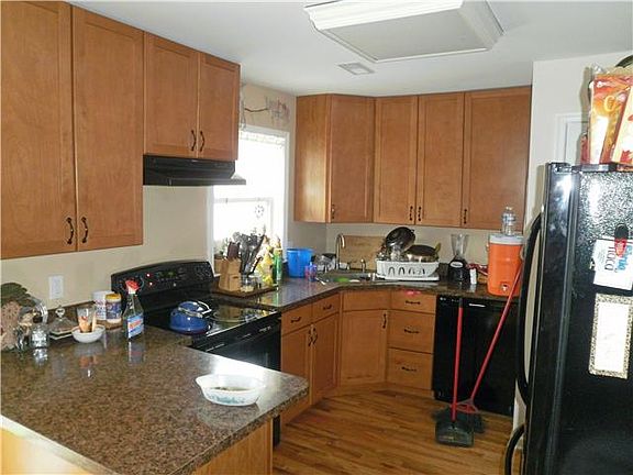 new eat in kitchen with hardwood floors