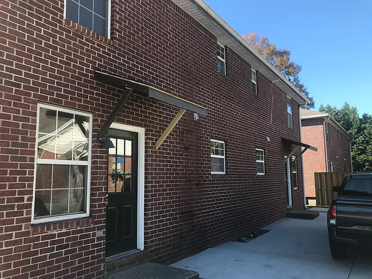 REAR ENTRANCE & PARKING