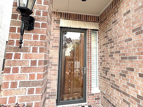 Additional glass storm door 