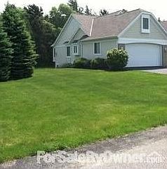 North Side of Condo - Lots of Windows : Garage window, kitchen box window, dining room bay window. S