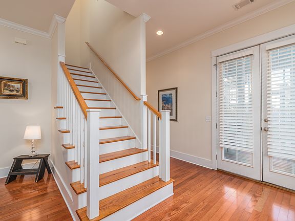 Living room stairs to 3 bdrm
