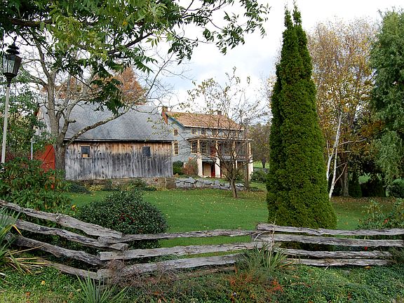Tractor shed and farm house