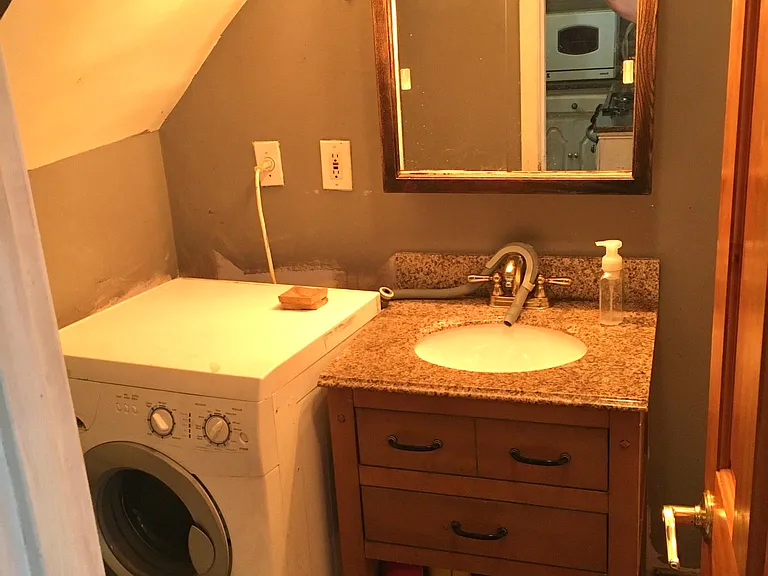bathroom with washing machine