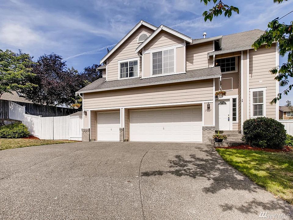 End of a cul de sac with a 3 car garage and enough parking for an RV!