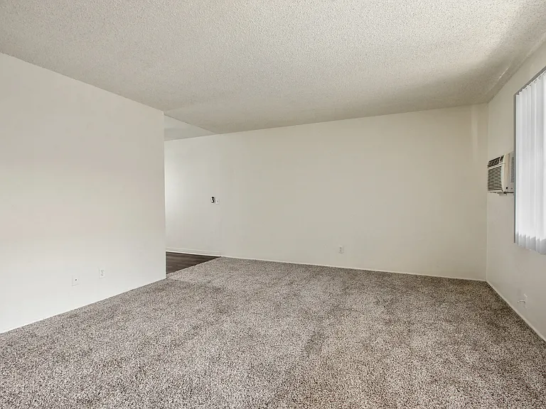 Living room with carpeted floors