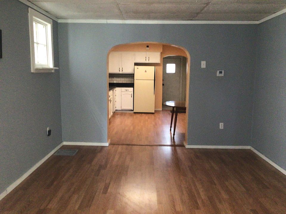 Living room looking into kitchen