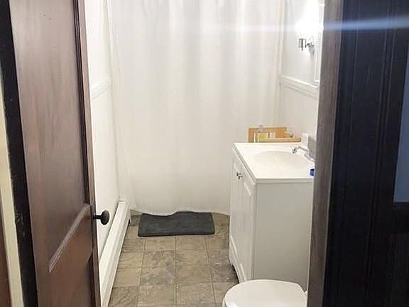 Full Bathroom with updated vanity and tub