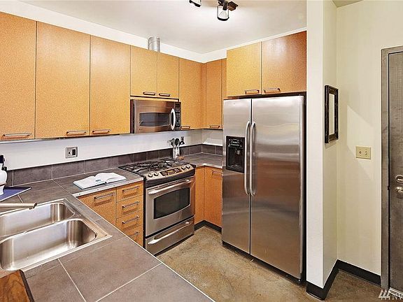 Kitchen with Stainless Steel Appliances & Gas Stove