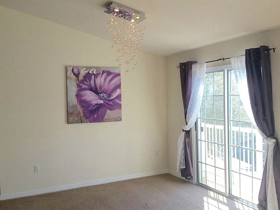 Dining space with hip chandelier