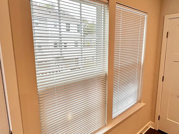 Update: Blinds have been installed all throughout the home.