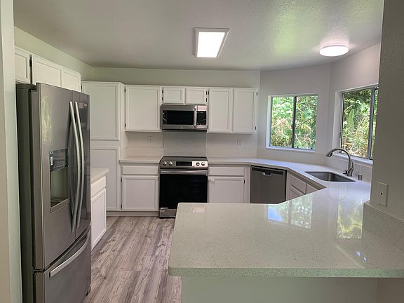 Kitchen with new stainless steel appliances
