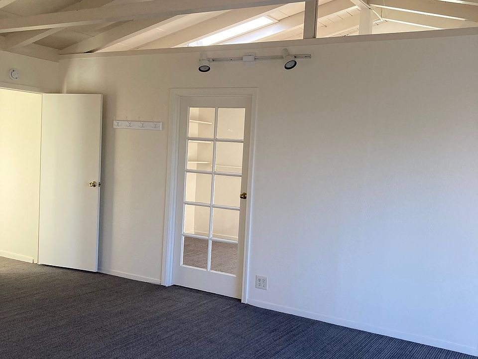 View of entry and bedroom door