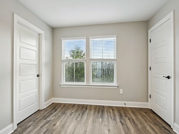 Primary bedroom in the Parker floorplan at a Meritage Homes community in Gulfport, MS.