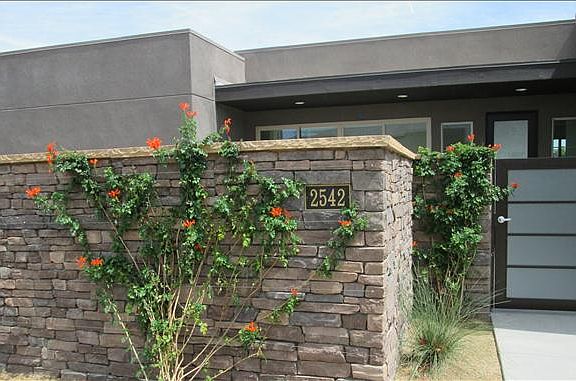 Beautiful stonework and desert landscaping