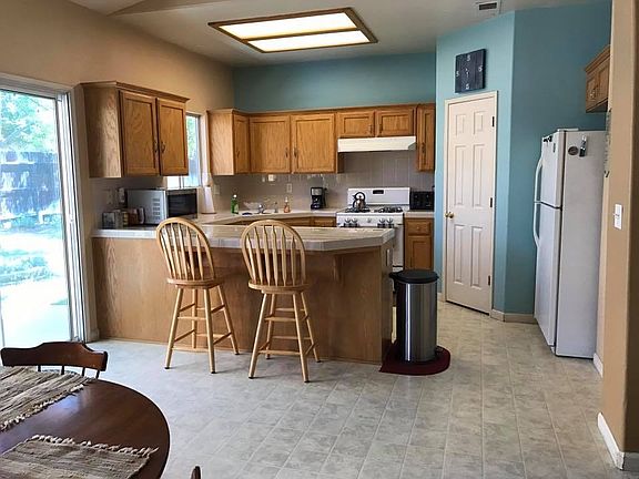 4th image of 6528 E Laurel Ave
