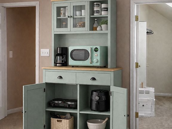 The kitchenette has plenty of room for dishes and other items.